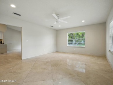 Tucked away in Fairgreen Estates on a manicured landscaped on New Smyrna Beach Golf Course in Florida - for sale on GolfHomes.com, golf home, golf lot