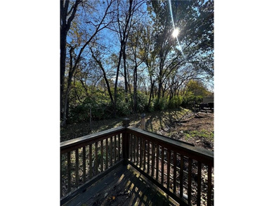 Beautifully Updated Mission Lake Townhome Backing to Scenic on Minor Park Golf Course in Missouri - for sale on GolfHomes.com, golf home, golf lot