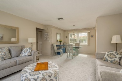Located in the heart of Palm Harbor, 102 Stanford Drive is on Highland Lakes Executive Golf Course in Florida - for sale on GolfHomes.com, golf home, golf lot