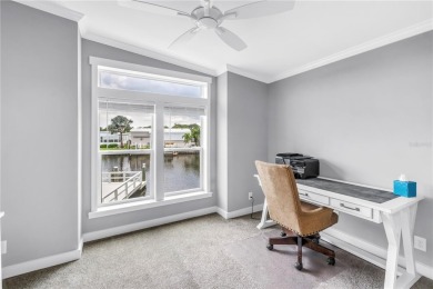 WATERFRONT LIVING | Fully Furnished | 2021 Palm Harbor Home
 on Mangrove Bay Golf Course in Florida - for sale on GolfHomes.com, golf home, golf lot