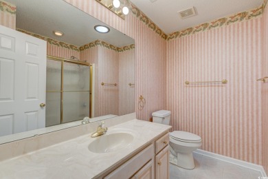 Nestled in the desirable gated community of Ashley Cove at on Heron Point Golf Club in South Carolina - for sale on GolfHomes.com, golf home, golf lot