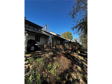 Beautifully Updated Mission Lake Townhome Backing to Scenic on Minor Park Golf Course in Missouri - for sale on GolfHomes.com, golf home, golf lot