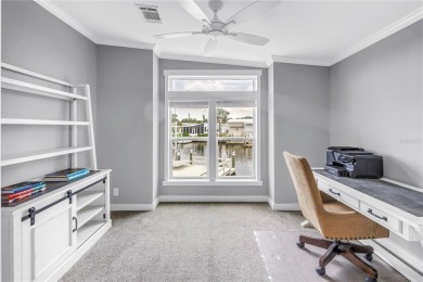 WATERFRONT LIVING | Fully Furnished | 2021 Palm Harbor Home
 on Mangrove Bay Golf Course in Florida - for sale on GolfHomes.com, golf home, golf lot