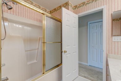 Nestled in the desirable gated community of Ashley Cove at on Heron Point Golf Club in South Carolina - for sale on GolfHomes.com, golf home, golf lot