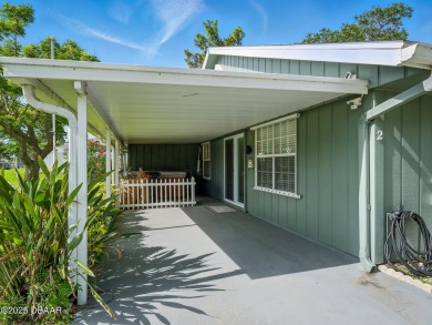 Tucked away in Fairgreen Estates on a manicured landscaped on New Smyrna Beach Golf Course in Florida - for sale on GolfHomes.com, golf home, golf lot