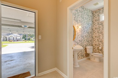 Nestled in the desirable gated community of Ashley Cove at on Heron Point Golf Club in South Carolina - for sale on GolfHomes.com, golf home, golf lot
