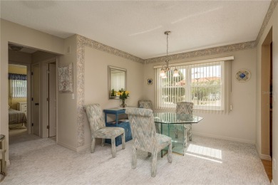Located in the heart of Palm Harbor, 102 Stanford Drive is on Highland Lakes Executive Golf Course in Florida - for sale on GolfHomes.com, golf home, golf lot