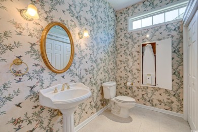 Nestled in the desirable gated community of Ashley Cove at on Heron Point Golf Club in South Carolina - for sale on GolfHomes.com, golf home, golf lot