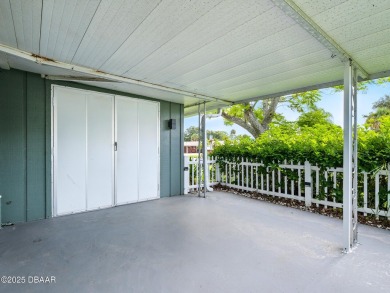 Tucked away in Fairgreen Estates on a manicured landscaped on New Smyrna Beach Golf Course in Florida - for sale on GolfHomes.com, golf home, golf lot