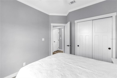 WATERFRONT LIVING | Fully Furnished | 2021 Palm Harbor Home
 on Mangrove Bay Golf Course in Florida - for sale on GolfHomes.com, golf home, golf lot