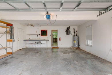 Nestled in the desirable gated community of Ashley Cove at on Heron Point Golf Club in South Carolina - for sale on GolfHomes.com, golf home, golf lot
