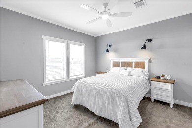 WATERFRONT LIVING | Fully Furnished | 2021 Palm Harbor Home
 on Mangrove Bay Golf Course in Florida - for sale on GolfHomes.com, golf home, golf lot