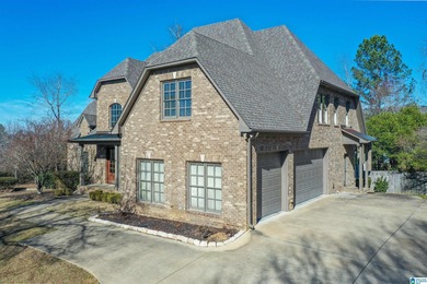 This custom home welcomes you with double front doors, an on Greystone Golf and Country Club-Founders Course in Alabama - for sale on GolfHomes.com, golf home, golf lot