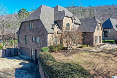 This custom home welcomes you with double front doors, an on Greystone Golf and Country Club-Founders Course in Alabama - for sale on GolfHomes.com, golf home, golf lot