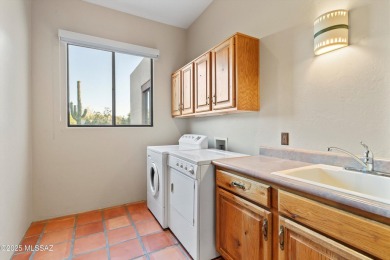 Step inside this magnificent Santa Fe style custom home. Soaring on Forty Niner Golf and Country Club in Arizona - for sale on GolfHomes.com, golf home, golf lot