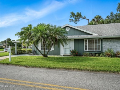Tucked away in Fairgreen Estates on a manicured landscaped on New Smyrna Beach Golf Course in Florida - for sale on GolfHomes.com, golf home, golf lot