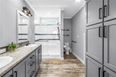 WATERFRONT LIVING | Fully Furnished | 2021 Palm Harbor Home
 on Mangrove Bay Golf Course in Florida - for sale on GolfHomes.com, golf home, golf lot