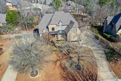 This custom home welcomes you with double front doors, an on Greystone Golf and Country Club-Founders Course in Alabama - for sale on GolfHomes.com, golf home, golf lot
