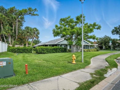 Tucked away in Fairgreen Estates on a manicured landscaped on New Smyrna Beach Golf Course in Florida - for sale on GolfHomes.com, golf home, golf lot