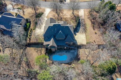 This custom home welcomes you with double front doors, an on Greystone Golf and Country Club-Founders Course in Alabama - for sale on GolfHomes.com, golf home, golf lot