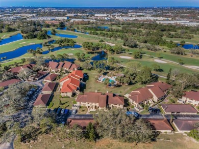 One or more photo(s) has been virtually staged. PRICE on Bardmoor Golf and Tennis Club in Florida - for sale on GolfHomes.com, golf home, golf lot