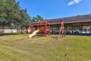 Nestled in the desirable gated community of Ashley Cove at on Heron Point Golf Club in South Carolina - for sale on GolfHomes.com, golf home, golf lot