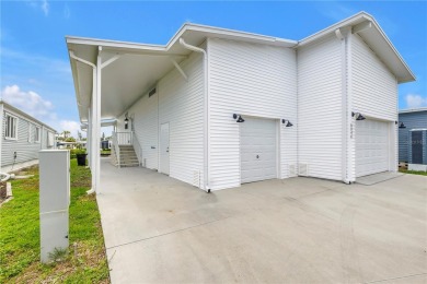 WATERFRONT LIVING | Fully Furnished | 2021 Palm Harbor Home
 on Mangrove Bay Golf Course in Florida - for sale on GolfHomes.com, golf home, golf lot