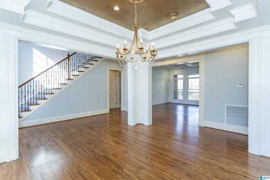 This custom home welcomes you with double front doors, an on Greystone Golf and Country Club-Founders Course in Alabama - for sale on GolfHomes.com, golf home, golf lot