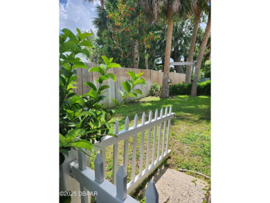 Tucked away in Fairgreen Estates on a manicured landscaped on New Smyrna Beach Golf Course in Florida - for sale on GolfHomes.com, golf home, golf lot