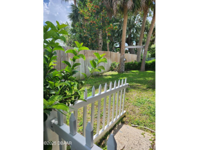 Tucked away in Fairgreen Estates on a manicured landscaped on New Smyrna Beach Golf Course in Florida - for sale on GolfHomes.com, golf home, golf lot