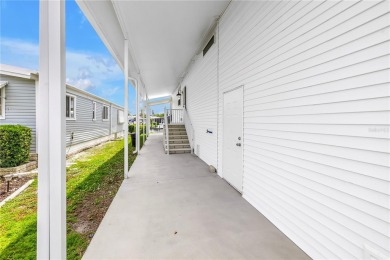 WATERFRONT LIVING | Fully Furnished | 2021 Palm Harbor Home
 on Mangrove Bay Golf Course in Florida - for sale on GolfHomes.com, golf home, golf lot