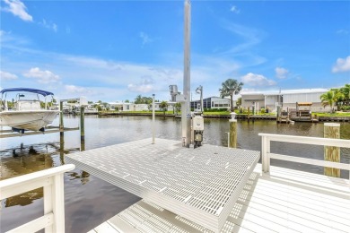 WATERFRONT LIVING | Fully Furnished | 2021 Palm Harbor Home
 on Mangrove Bay Golf Course in Florida - for sale on GolfHomes.com, golf home, golf lot