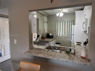 Welcome to your dream condo located in the country club on Pine Island Ridge Country Club in Florida - for sale on GolfHomes.com, golf home, golf lot