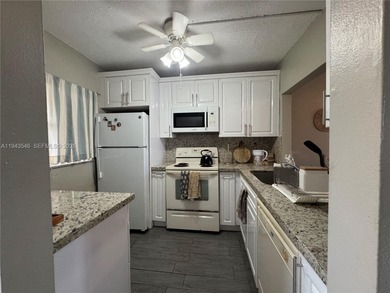 Welcome to your dream condo located in the country club on Pine Island Ridge Country Club in Florida - for sale on GolfHomes.com, golf home, golf lot