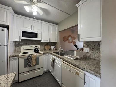 Welcome to your dream condo located in the country club on Pine Island Ridge Country Club in Florida - for sale on GolfHomes.com, golf home, golf lot