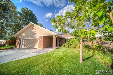 WELCOME HOME TO THIS BEAUTIFUL BRICK RANCH LOCATED ON A QUIET on Eagle Trace Golf Club in Colorado - for sale on GolfHomes.com, golf home, golf lot