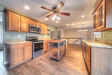 WELCOME HOME TO THIS BEAUTIFUL BRICK RANCH LOCATED ON A QUIET on Eagle Trace Golf Club in Colorado - for sale on GolfHomes.com, golf home, golf lot