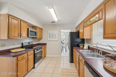 Welcome to this beautifully maintained 3-bedroom, 2-bathroom on Bent Creek Golf Course in Florida - for sale on GolfHomes.com, golf home, golf lot