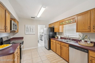 Welcome to this beautifully maintained 3-bedroom, 2-bathroom on Bent Creek Golf Course in Florida - for sale on GolfHomes.com, golf home, golf lot