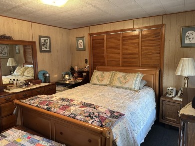 If you are looking for a cozy home or up north retreat look no on Garland Resort and Golf Club  in Michigan - for sale on GolfHomes.com, golf home, golf lot