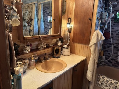 If you are looking for a cozy home or up north retreat look no on Garland Resort and Golf Club  in Michigan - for sale on GolfHomes.com, golf home, golf lot