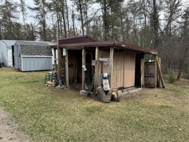 If you are looking for a cozy home or up north retreat look no on Garland Resort and Golf Club  in Michigan - for sale on GolfHomes.com, golf home, golf lot