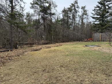 If you are looking for a cozy home or up north retreat look no on Garland Resort and Golf Club  in Michigan - for sale on GolfHomes.com, golf home, golf lot