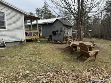 If you are looking for a cozy home or up north retreat look no on Garland Resort and Golf Club  in Michigan - for sale on GolfHomes.com, golf home, golf lot