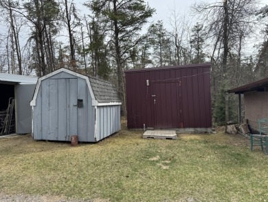If you are looking for a cozy home or up north retreat look no on Garland Resort and Golf Club  in Michigan - for sale on GolfHomes.com, golf home, golf lot