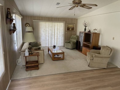 Immaculate two bedroom, two bath home with a two-car garage in on Del Tura Golf and Country Club in Florida - for sale on GolfHomes.com, golf home, golf lot