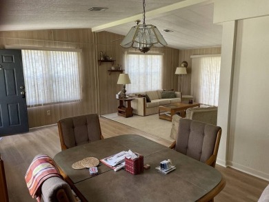 Immaculate two bedroom, two bath home with a two-car garage in on Del Tura Golf and Country Club in Florida - for sale on GolfHomes.com, golf home, golf lot