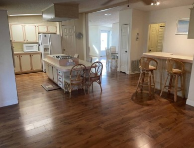 Immaculate two bedroom, two bath home with a two-car garage in on Del Tura Golf and Country Club in Florida - for sale on GolfHomes.com, golf home, golf lot