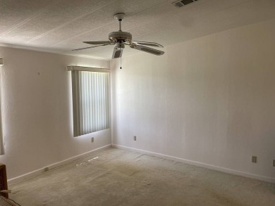 Immaculate two bedroom, two bath home with a two-car garage in on Del Tura Golf and Country Club in Florida - for sale on GolfHomes.com, golf home, golf lot