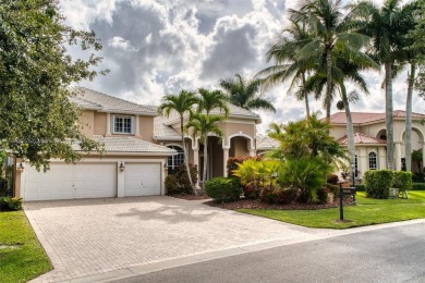 SPECTACULAR WATER VIEWS FROM 5 BED, 4 FULL BATH, POOL WITH on Heron Bay Golf Club in Florida - for sale on GolfHomes.com, golf home, golf lot